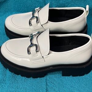 LadiesWhite Loafers with Silver Buckle